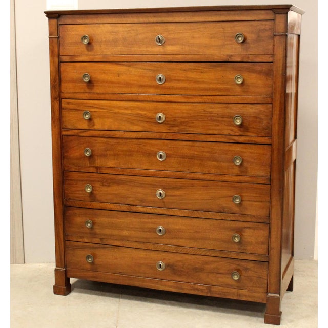 Empire Weekly In solid walnut Early 19th century period - Empire Measurements: width 130 cm, depth 53 cm, height 156 cm...