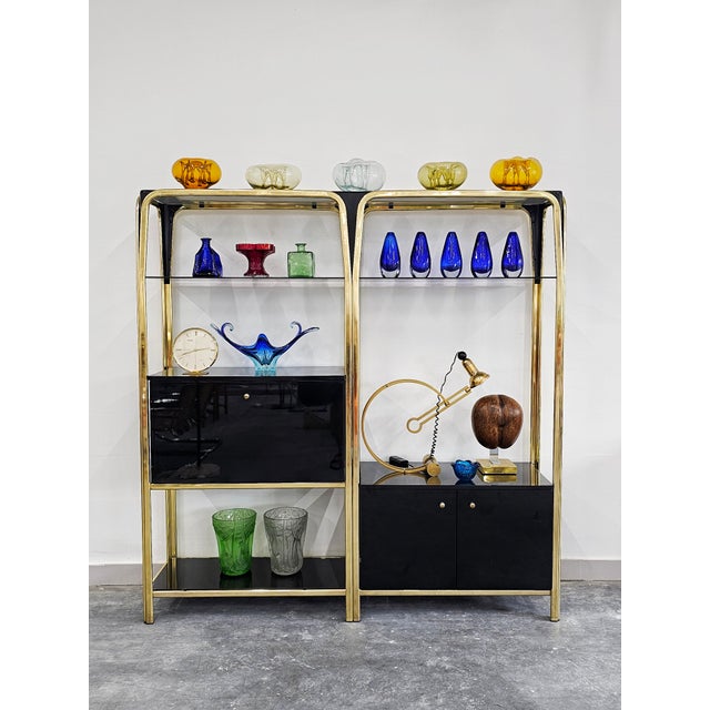 In this listing you will find a spectacular modular wall unit or modular shelving system. It is done in black lacquered...