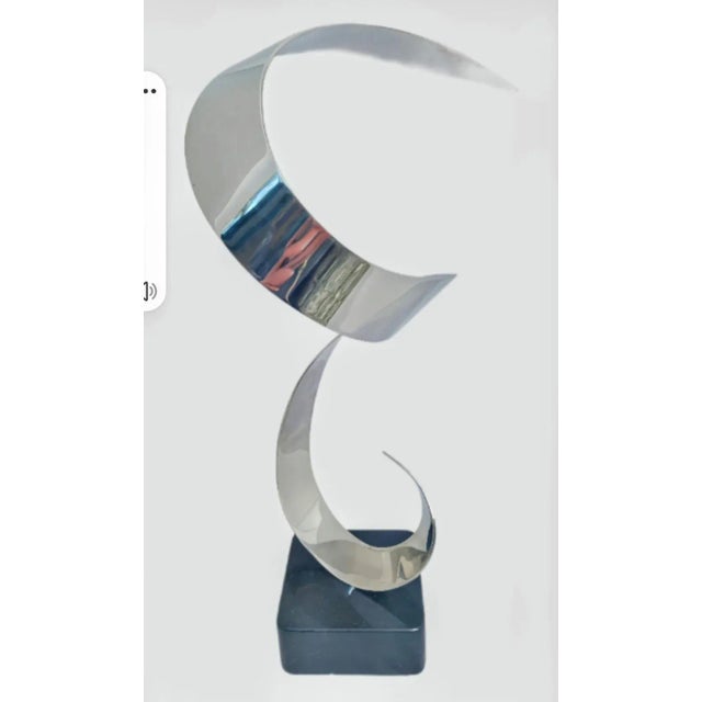 Dramatic Polished Steel Sculpture vintage ribbon sculpture KELLY GRONLEY (1946 - 2009) Kelly Gronley was a Los Angeles...