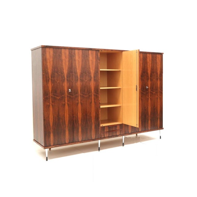 Large Vintage Italian 5-Door Wardrobe with Stylish Adjustable Legs, 1960s, in Good conditions. Designed 1960 to 1969