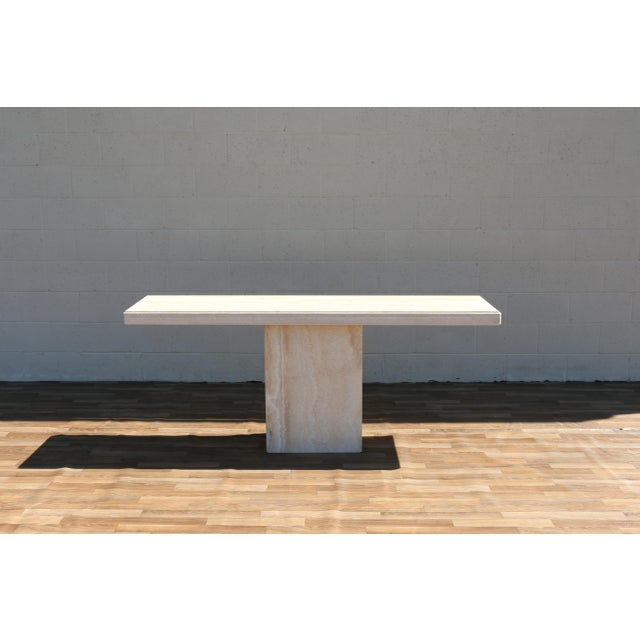 Exceptional 1980s Italian Postmodern console table by Stone International, beautifully crafted in warm beige travertine...