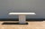 Exceptional 1980s Italian Postmodern console table by Stone International, beautifully crafted in warm beige travertine...