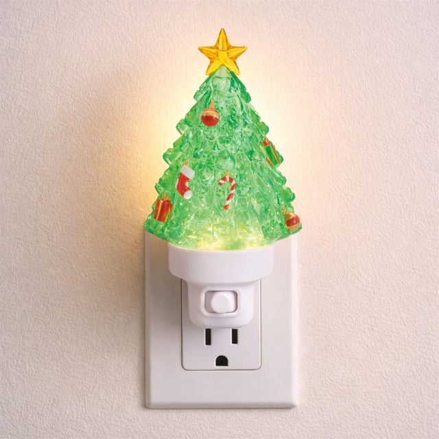 Light up the season with the Christmas Tree Snow Globe Night Light, a charming holiday accent that brings instant warmth...