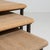 Originating from France circa 1970, this distinguished set of three nesting tables exemplifies the enduring appeal of...