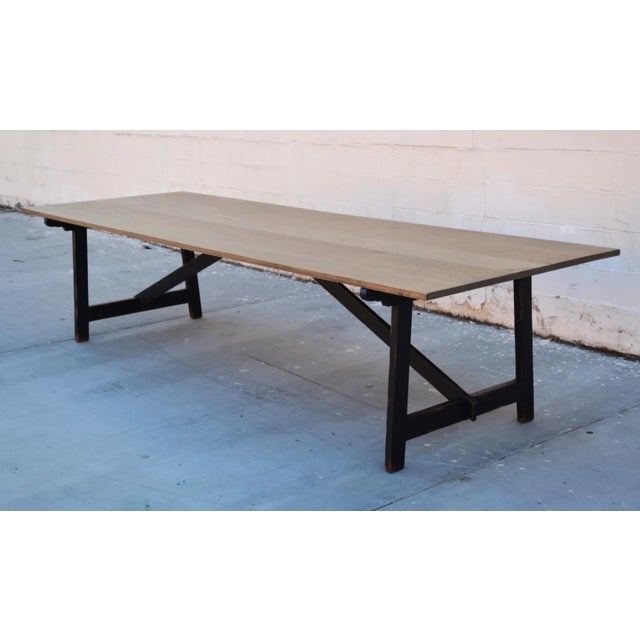 This rift sawn dining table with a painted base is seen here in 144" x 44", however it can be ordered in any size. The...