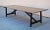 This rift sawn dining table with a painted base is seen here in 144" x 44", however it can be ordered in any size. The...