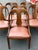 Exquisite set of dining chairs by Walter E Smithe . Features antique French Empire styling , solid wood frames with rustic...