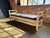 Charming painted wood daybed bench with brand new wool upholstery and foam.
