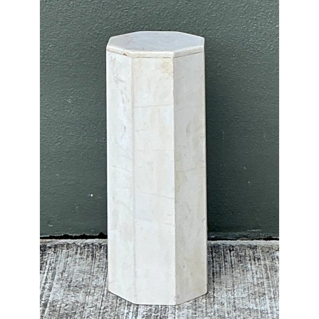 This vintage Traditional hexagonal pedestal is crafted from white marble with a smoothly finished geometric form. Its...