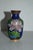 Vintage (1980's) Mini Vase is Chinese. Cloisonné - Multi-Colored with Floral Designs. The Measurements: 2"Diam. x 3"H....