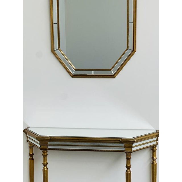 Console table: 120 cm w × 38 cm d × 82 cm h mirror: 74 cm w × 93 cm h a sophisticated mirrored console table with matching...