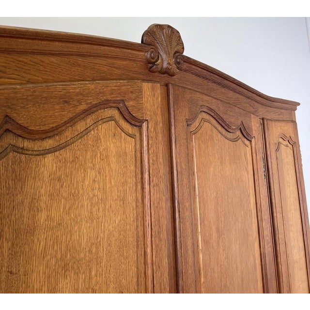 Vintage Louis XVI French Four Door Oak Carved Armoire For Sale - Image 5 of 12
