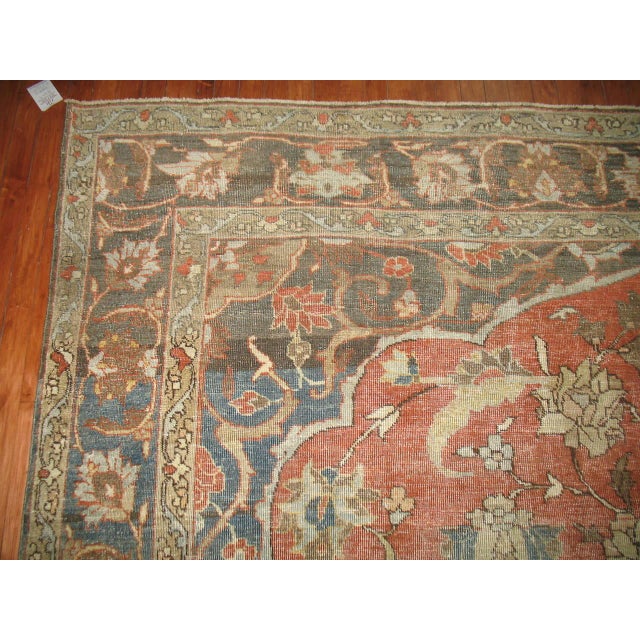 Classic early 20th century persian Tabriz rug with soft earthy palette. Terracotta field, soft cool blues and greens with...