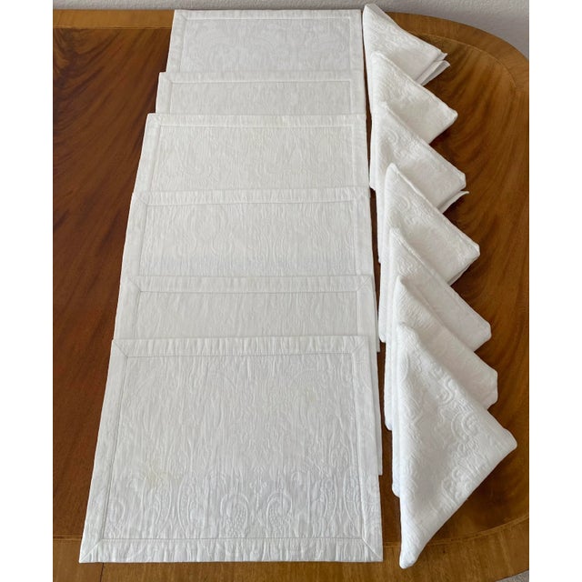 Waterford Table Linens Vintage White Set of Seven Placemats and Napkins. The placemat measures. 17.25 inches wide and...