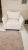 White classic deep armchair. It has a micro suede fabric that can be easily cleaned and the seat and back cushion can be...