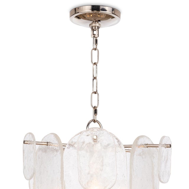 Modern and elegant, panes of striking water glass adorn the Echo Pendant to create a dynamic lighting piece. Each glass...