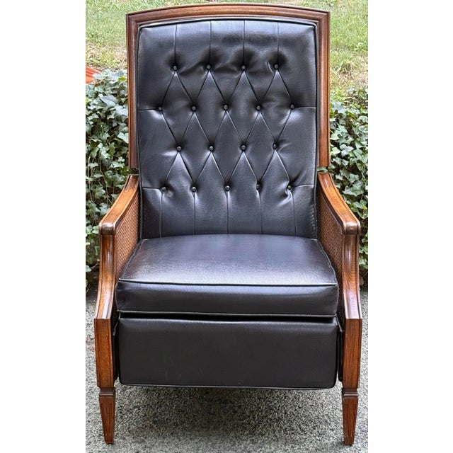 A rare collectors item - this mid century lounger retains its vintage charm with the original upholstery and wood finish....