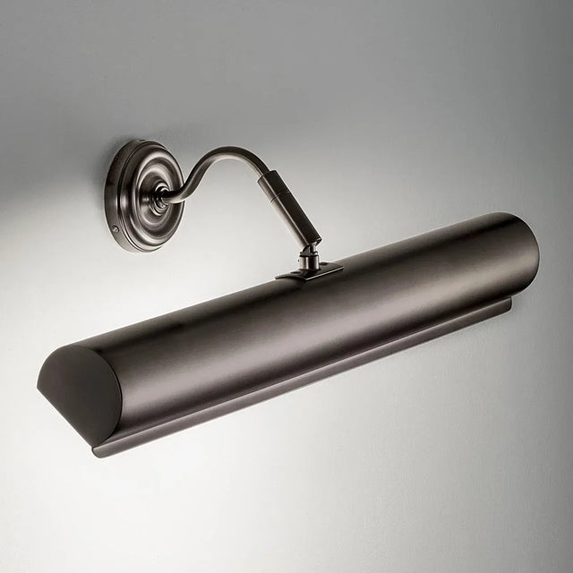 Detailed Backplate And Swan Neck Arm With Swivel Joint Supports Tubular Canopy With Anti-glare Baffle On The Front.