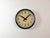 This wall clock was manufactured by IBM in the United States in the 1950s. It features a black metal frame, an iron...