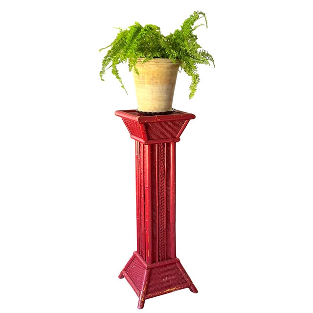 A wonderfully decorative vintage bamboo and rattan plant stand, finished in a rich, timeworn coral red. Standing 31 inches...