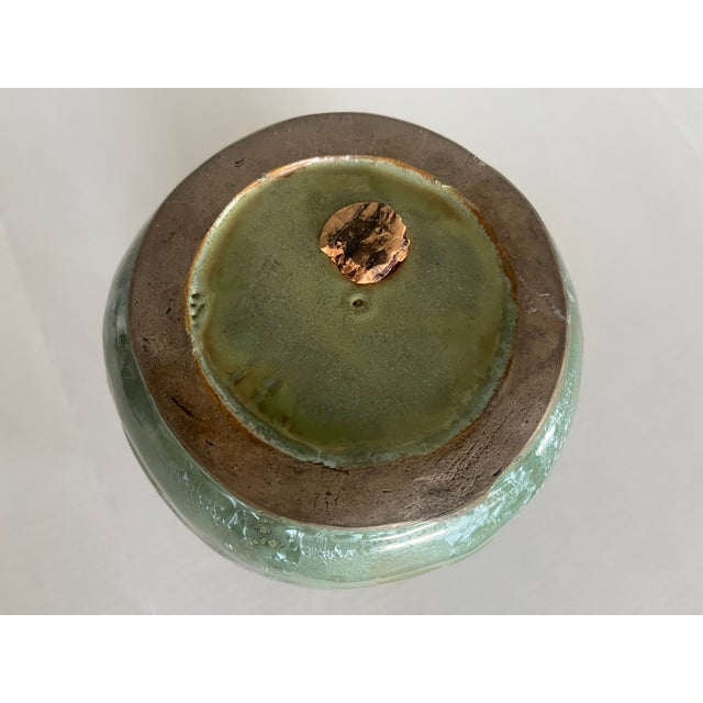 Secessionist styling, arched line framing panels down the side echoes organic. A soft green with crystallization...