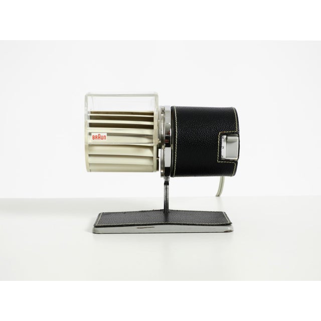 A very rare, original braun hl 1 table fan from 1961, featuring a dark blue leather details. designed by reinhold weiss....