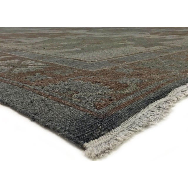 Vintage Afghan Soumak Overdyed Rug, meticulously hand-woven in Afghanistan utilizing traditional wool pile on cotton...