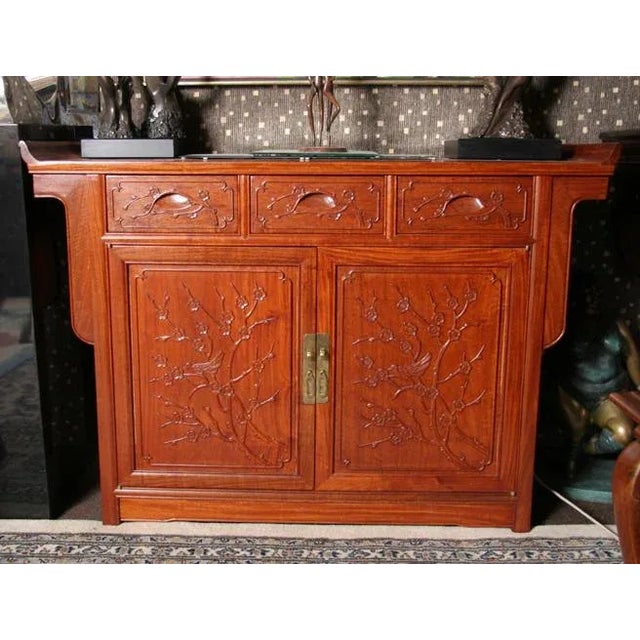 Asian Buffet with Magnolia Branches Furniture Date: Circa 1950 Carved Magnolias and Birds with Two Doors, Three Drawers,...