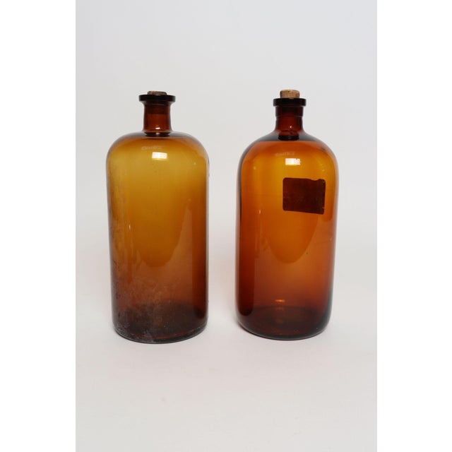 Set of two vintage American amber glass apothecary/medicine bottles known as "Druggist's Packing Bottles" coined by the...
