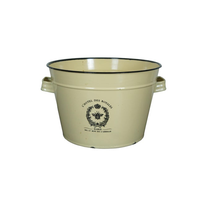 Late 20th century metal enamelware hotel beverage / champagne / wine / ice bin / bucket. Pale yellow with black trim and...