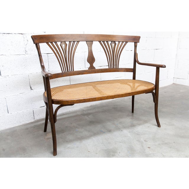Fischel bench, 1930s, bentwood frame with hand-woven caning. In excellent condition, both the frame and caning show some...