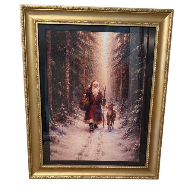 A beautifully atmospheric Christmas canvas print depicting Santa Claus walking alongside a reindeer through a snow-covered...
