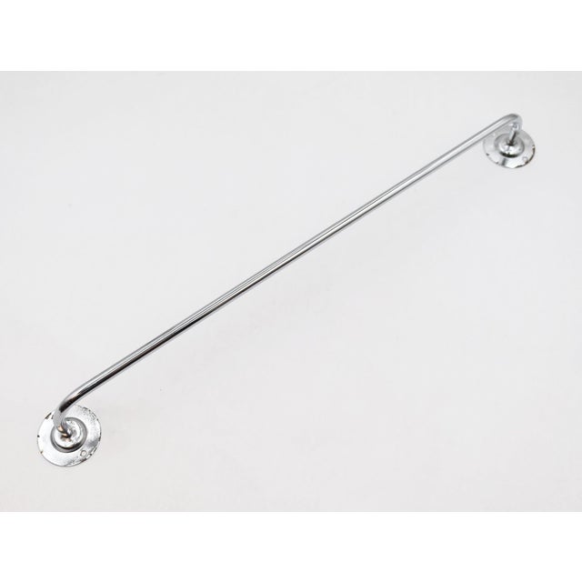 Reclaimed simple design chrome plated steel surface mount towel rack. The original mounting screws are not available. Good...