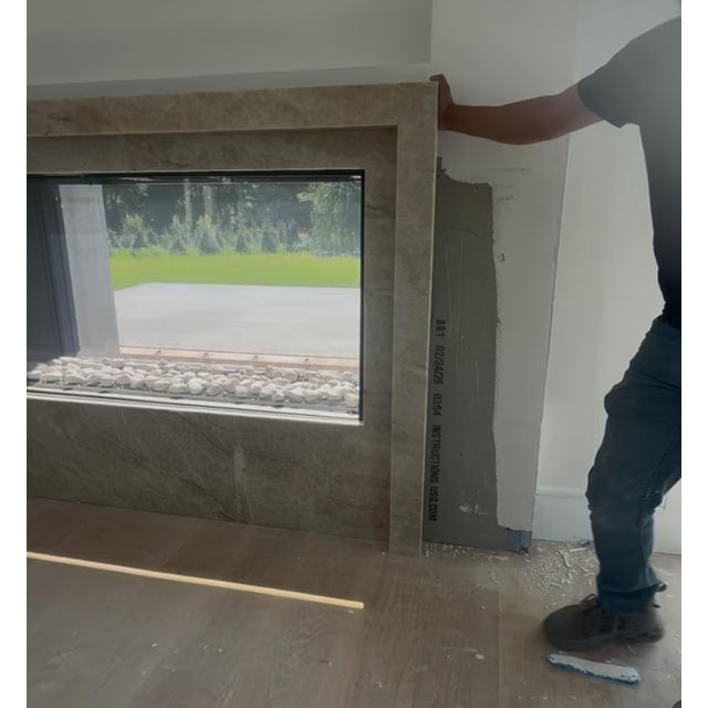 Stunning custom Taj quartzite fireplace surround with clean, contemporary, modern, tiered design. Fitted for gas...