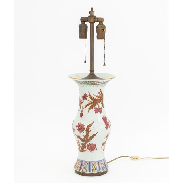 Chinese Famille Rose Porcelain Vase Mounted as a Table Lamp, the vessel hand-enameled with chrysanthemum flowers, the lamp...