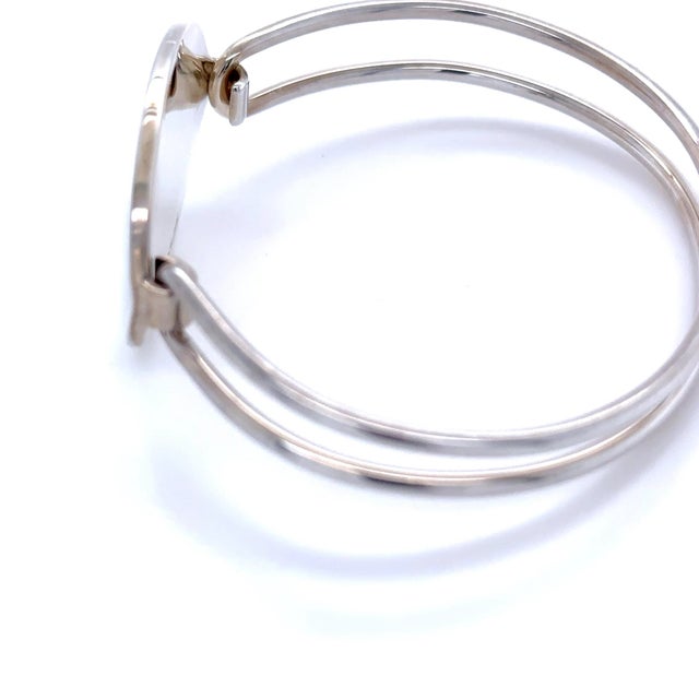 A classic vintage Tiffany & Co. Oval ID bracelet crafted in sterling silver, featuring a clean oval profile and signature...