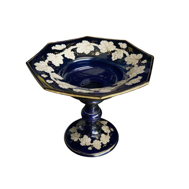 A beautiful antique compote hand painted with grapes and leaves both inside the dish and also around the bottom. A very...