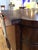 A handsome and finely proportioned 19th-century Georgian style mahogany sideboard of serpentine form, raised on elegant...