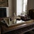 Vintage rectangular mirrored vanity tray, made in Denmark. Features a mirrored glass base set in an ornate brass frame...