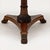 This is a Maitland-Smith neo-classical style inlaid mahogany round dining or center table. It is a mix of veneers to...