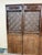 Design Plus Gallery presents a Carved Wood Folding Screen. The screen has open fretwork lattice panels, pierced scrollwork...