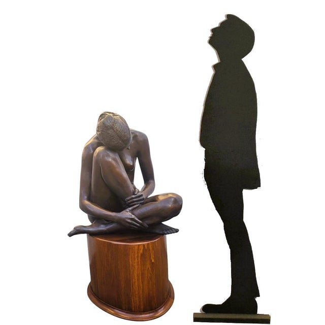 Large patinated bronze sculpture of a nude woman seated on a wooden base. Signed M Ventura P on the base - 1980s Light...