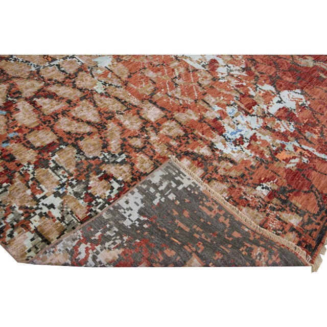 Beautiful modern hand-knotted wool and silk rug with orange, blue, gray, and tan field. This Modern rug has a gorgeous...