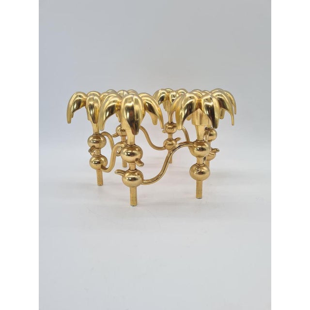 Nagel Germany “Palm” Candlestick, featuring a striking gold finish. A model with a unique, sculptural form inspired by...
