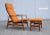 Poul Volther teak 350 highback armchair and ottoman with orange fabric made for Frem Rojle in Denmark from the 1960s....