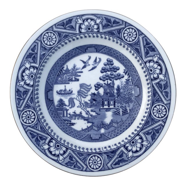 Offered is a set of eleven antique Wedgwood plates and shallow bowls made between 1878 and 1900. Rimmed in gold, there are...