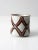 This is a vintage Otagiri style mug circa 1970. The classic mug has a speckled glaze with big crossing x's in orange and...
