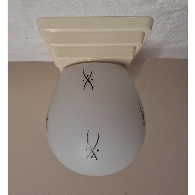 Mid-Century Modern Ceiling Lamp with Stepped Cream-White Bakelite Base and White Glass Shade with Hand-Painted Black Decor...