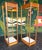 Postmod etagere pair comprised of oak veneers, metal frame, and glass shelves. Perfect pair to flank a sideboard or be...