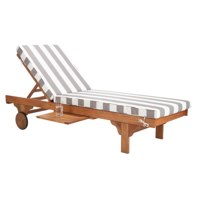 A fresh update of a of a English garden classic, the outdoor chaise lounge chair recalls the manicured landscapes of Rhode...